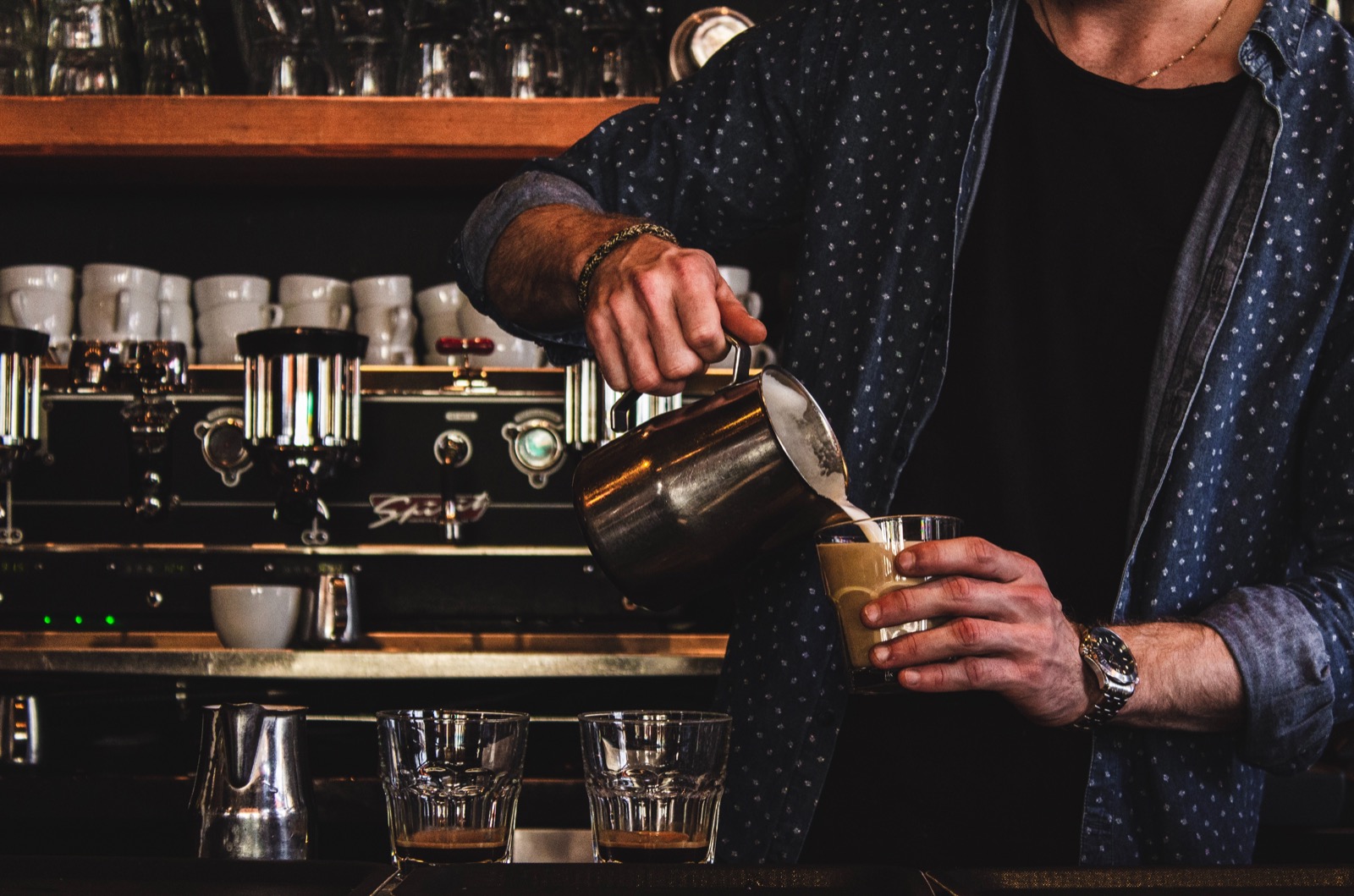 barista making coffee