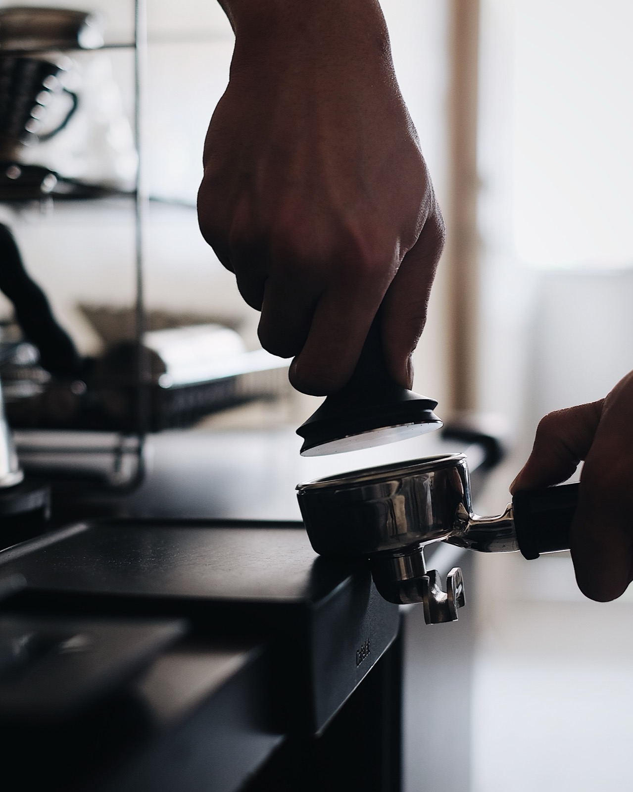 tamping coffee
